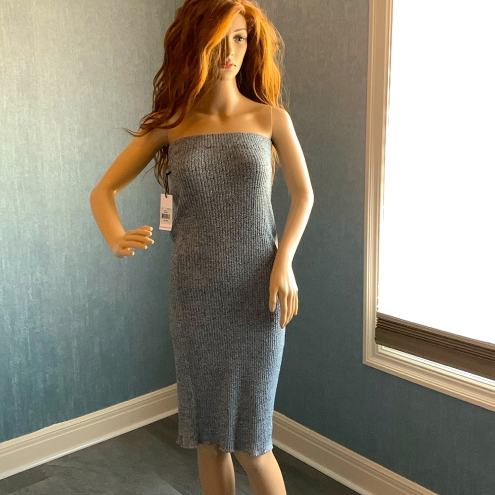 Medium gray blend skirt or dress. Sweater material. No slit.